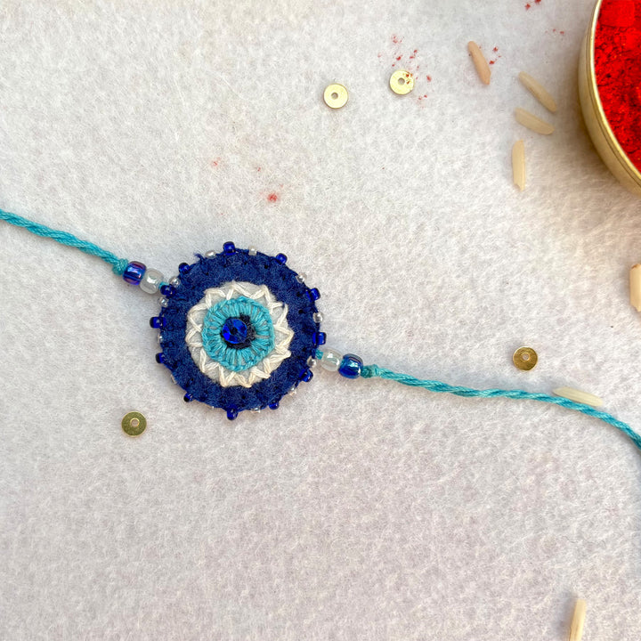 Hand Embroidered Nazar Battu Rakhi With Roli Chawal For Brother