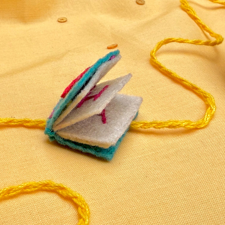 Hand Embroidered Book Rakhi With Keychain For Brother