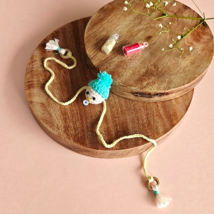 Handmade Crochet "It’s a Boy" Rakhi For Newborns With Roli Chawal