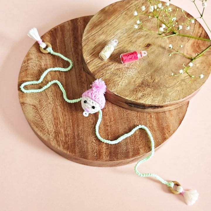 Handmade Crochet "It’s a Girl" Rakhi For Newborns With Roli Chawal
