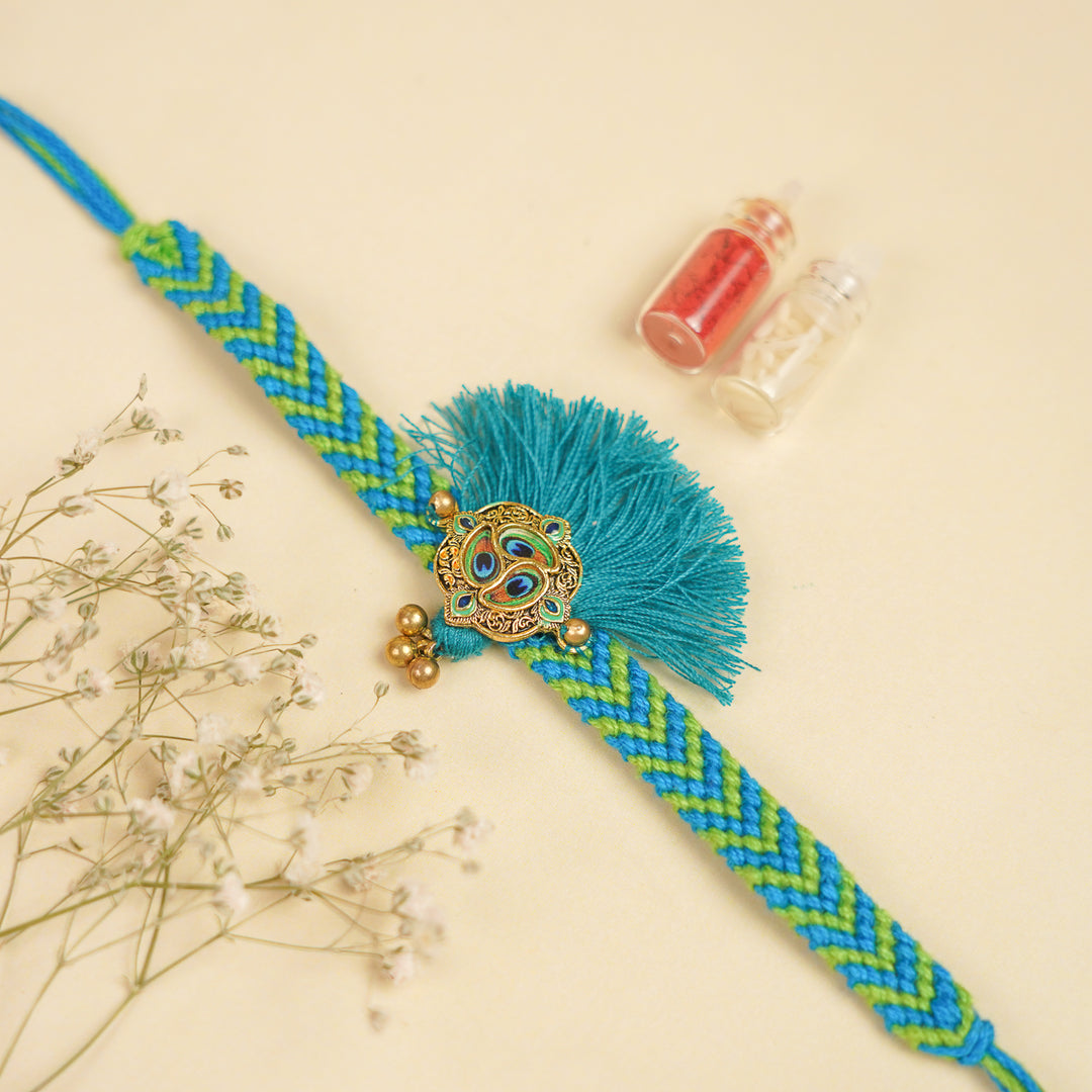 Handmade Blue Peacock Feather Rakhi With Roli Chawal For Brother