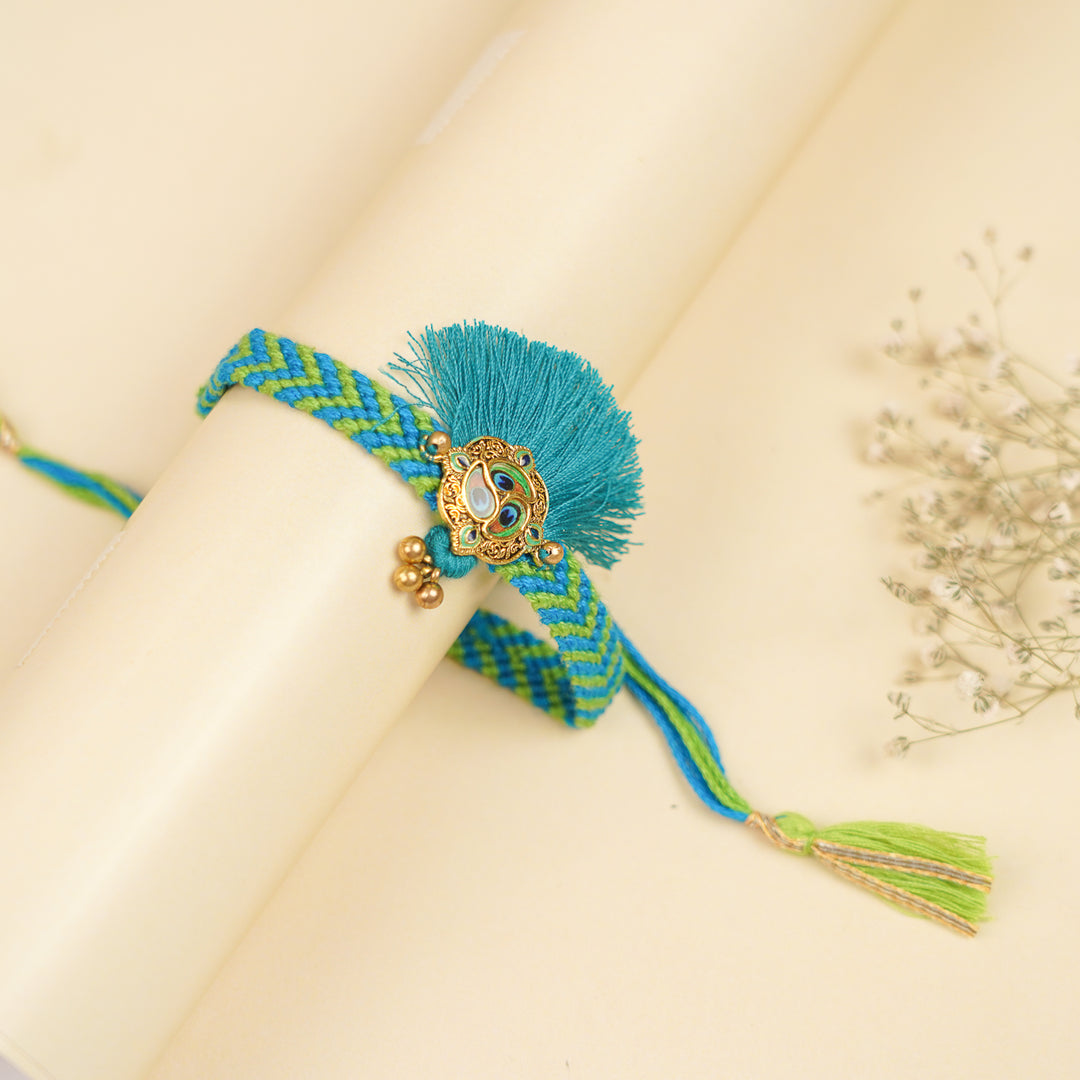 Handmade Blue Peacock Feather Rakhi With Roli Chawal For Brother