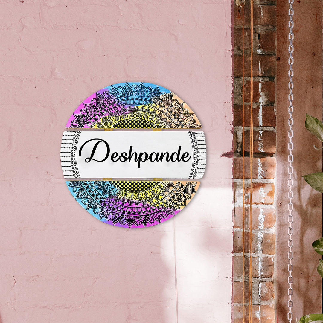 Handcrafted Personalized Mandala Round Pinewood Name Plate 3 - Mounted on Pink Wall Side View
