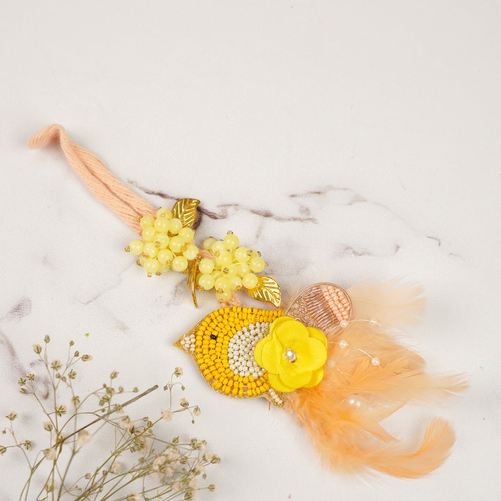 Handmade Beaded Floral Yellow Lumba Rakhi For Bhabhi
