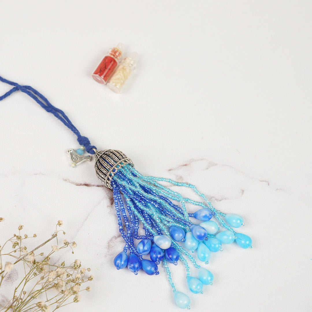 Handmade Bead Embellished Blue Lumba Rakhi For Bhabhi