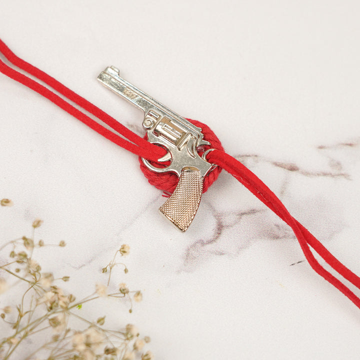 Handmade Gun Shaped Metal Rakhi For Brother