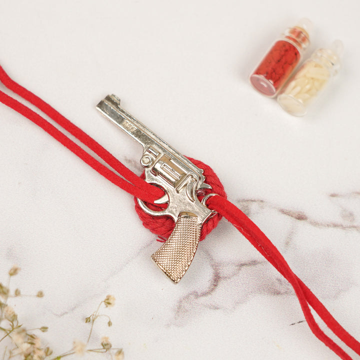 Handmade Gun Shaped Metal Rakhi For Brother