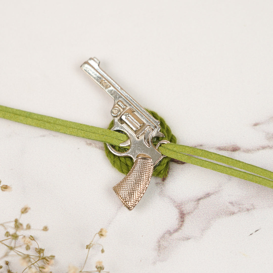 Handmade Gun Shaped Metal Rakhi For Brother