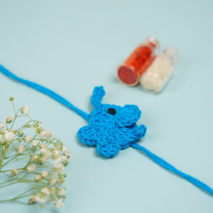 Customized Handmade Crochet Elephant Theme Rakhi With Roli Chawal - Blue Rakhi with Roli Chawal