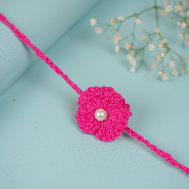 Handmade Crochet Scarlet Knot Bhaiya Bhabhi Rakhi With Roli Chawal - Full view with decorative elements