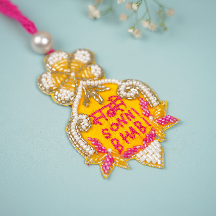 Handmade Beaded Sabse Sona Bhabhi Lumba Rakhi For Bhabhi With Roli Chawal - Close-up of Beaded Design