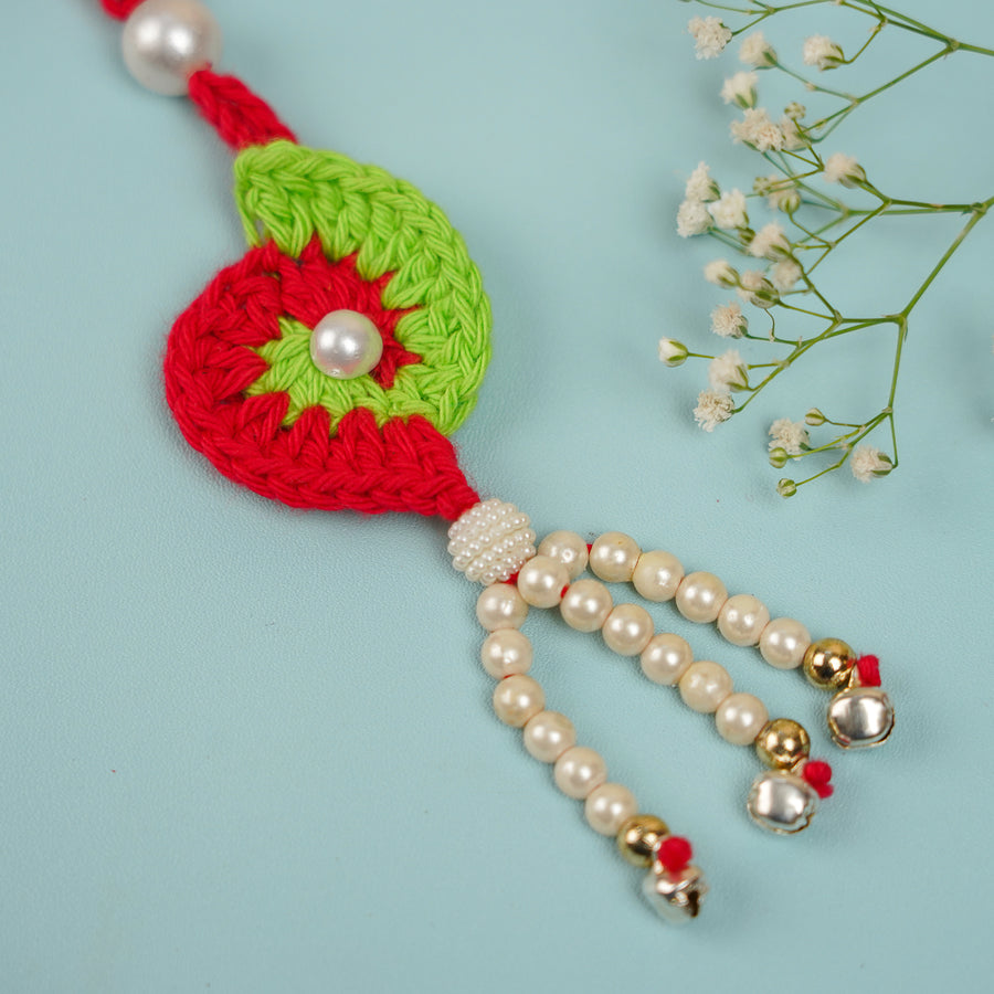 Customized Handmade Crochet Spiral Lumba Rakhi For Bhabhi With Roli Chawal - Close-up Detail View
