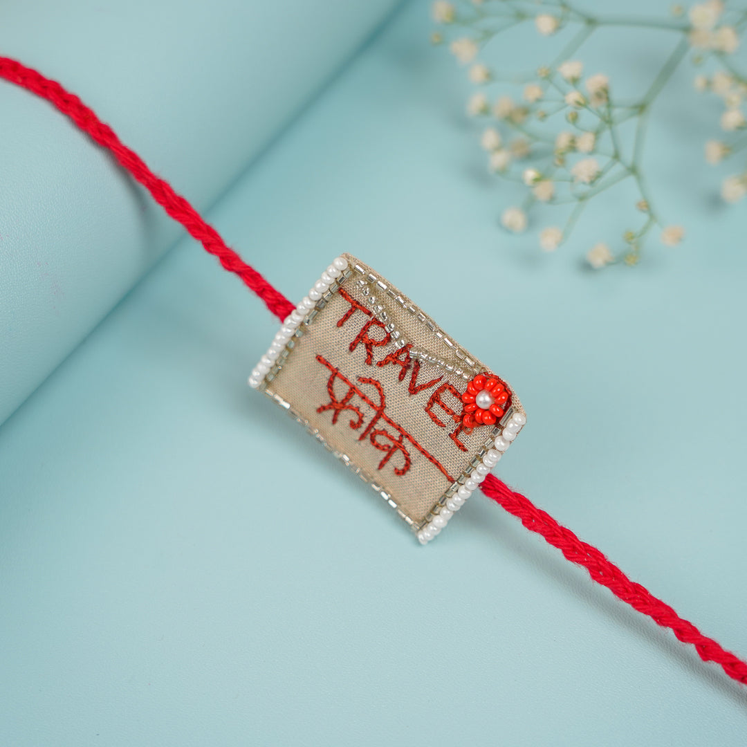 Handmade Beaded Travel Freak Bhaiya Bhabhi Rakhi With Roli Chawal - Close-up Back View Alternate