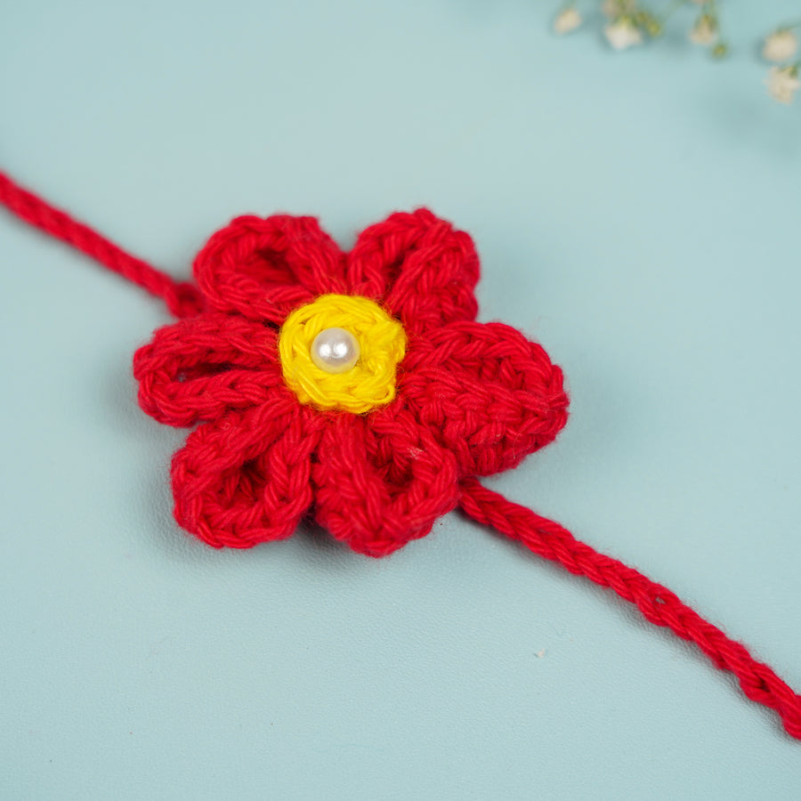 Customized Handmade Crochet Rubi Petal Floral Lumba Rakhi For Bhabhi With Roli Chawal - Close-up Front View