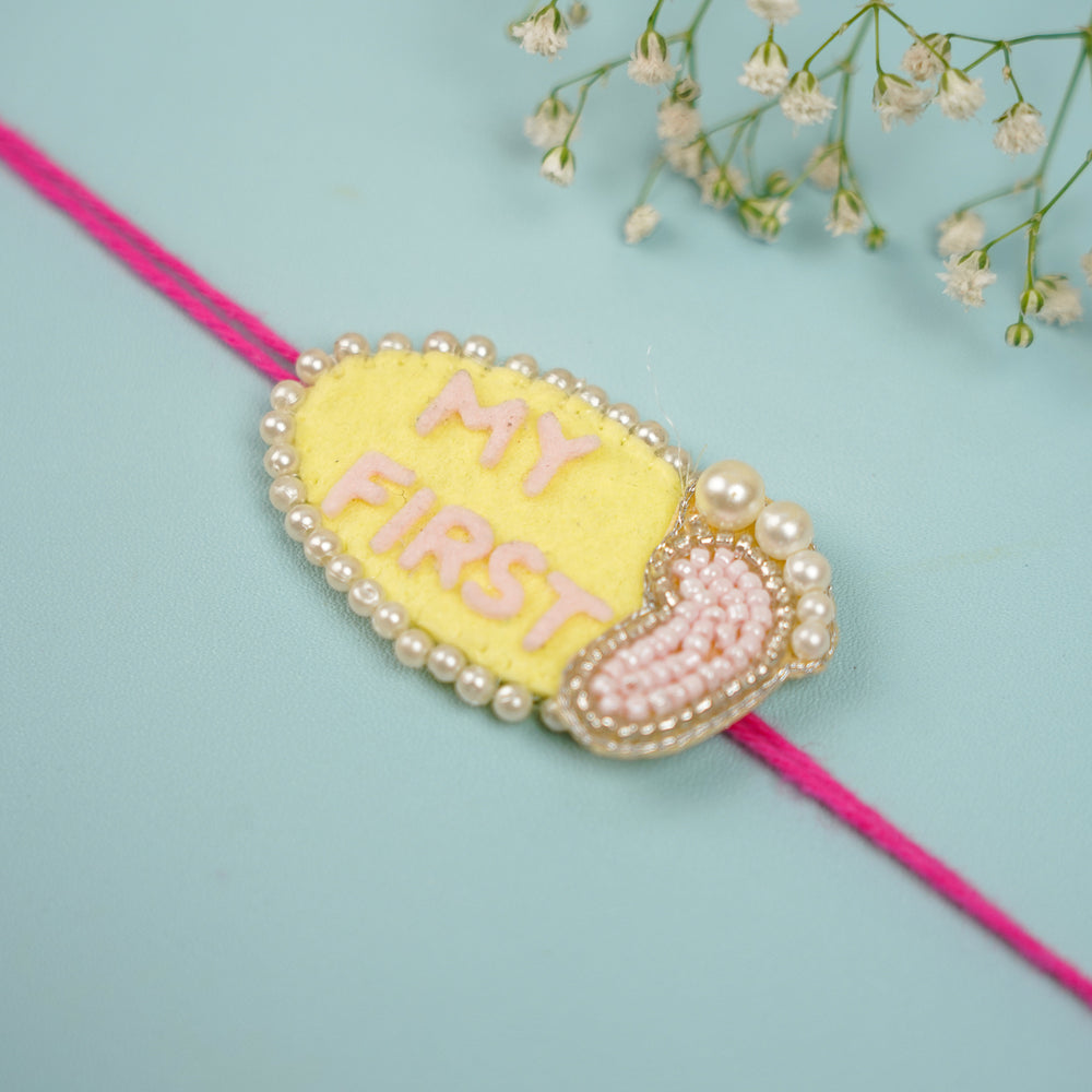 Customized Handmade Beaded My First Rakhi With Roli Chawal For Newborns 10 - Close-up View of Rakhi