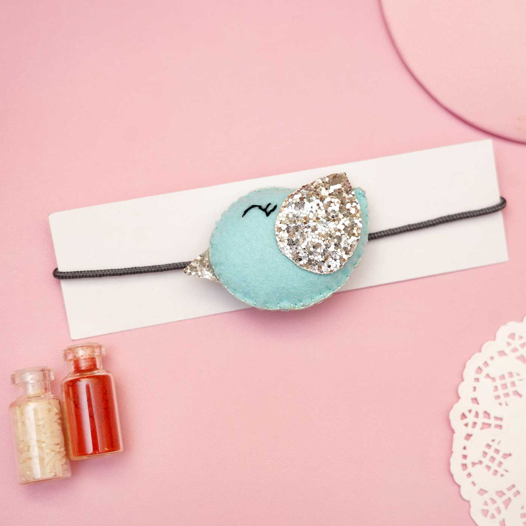 Handmade Bird Felt Rakhi With Roli Chawal - Product on Display Card