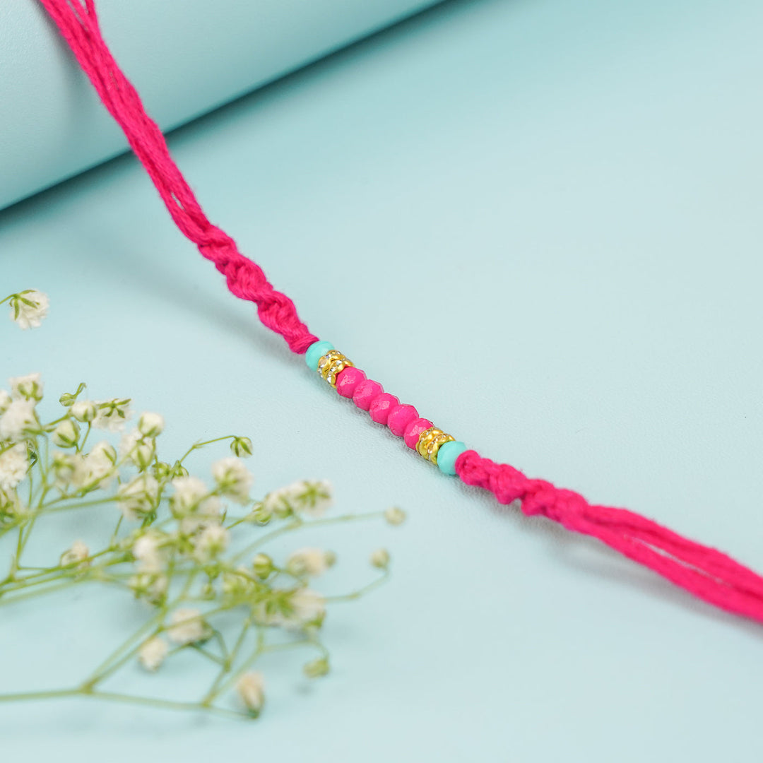 Handmade Beaded Pink Rakhi With Roli Chawal - Close-up of Beaded Section