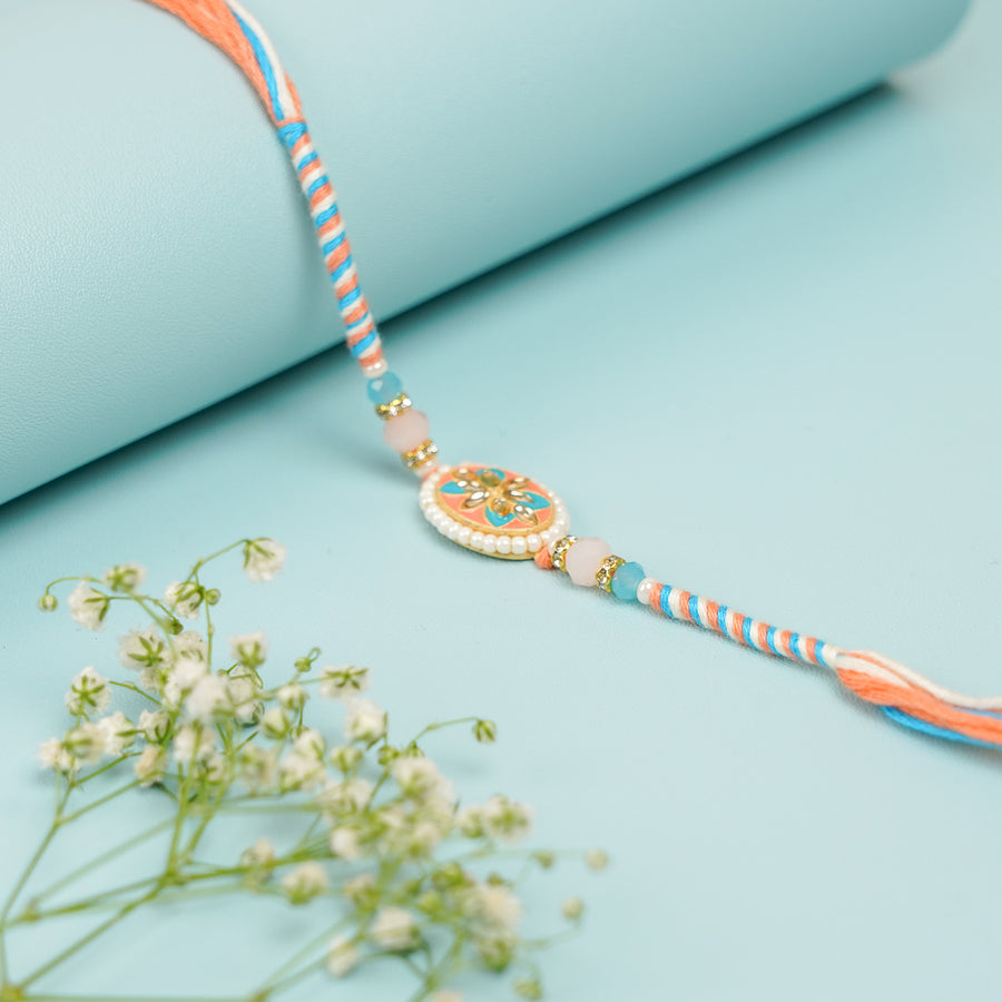 Handmade Beaded Peach And Blue Rakhi With Roli Chawal Set Of 2 - Close-up of bracelet detail