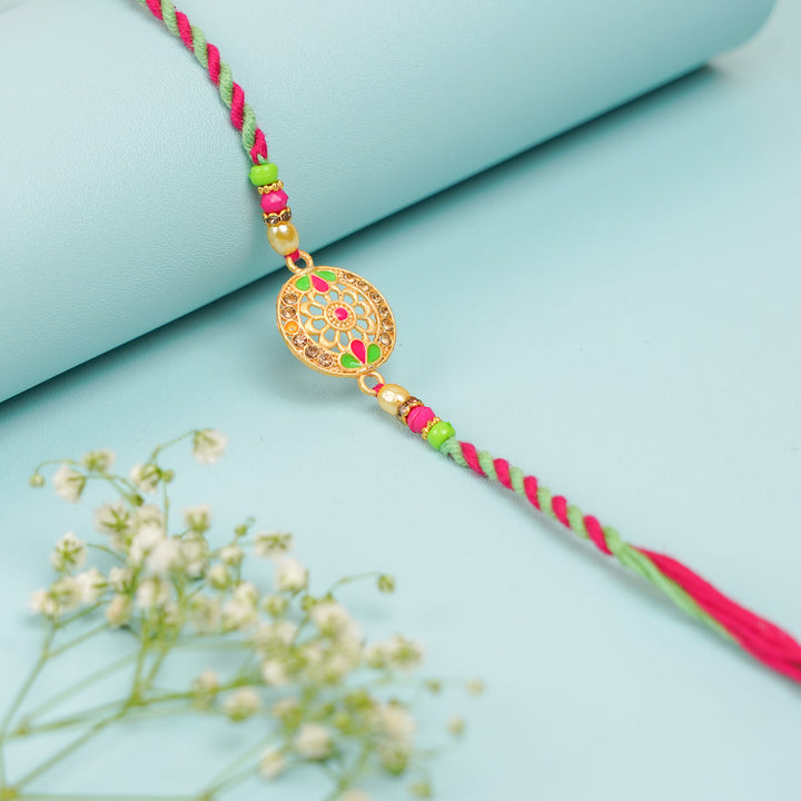 Handmade Pink Green Jadtar Round Rakhi With Roli Chawal - Close-up of Bracelet Detail
