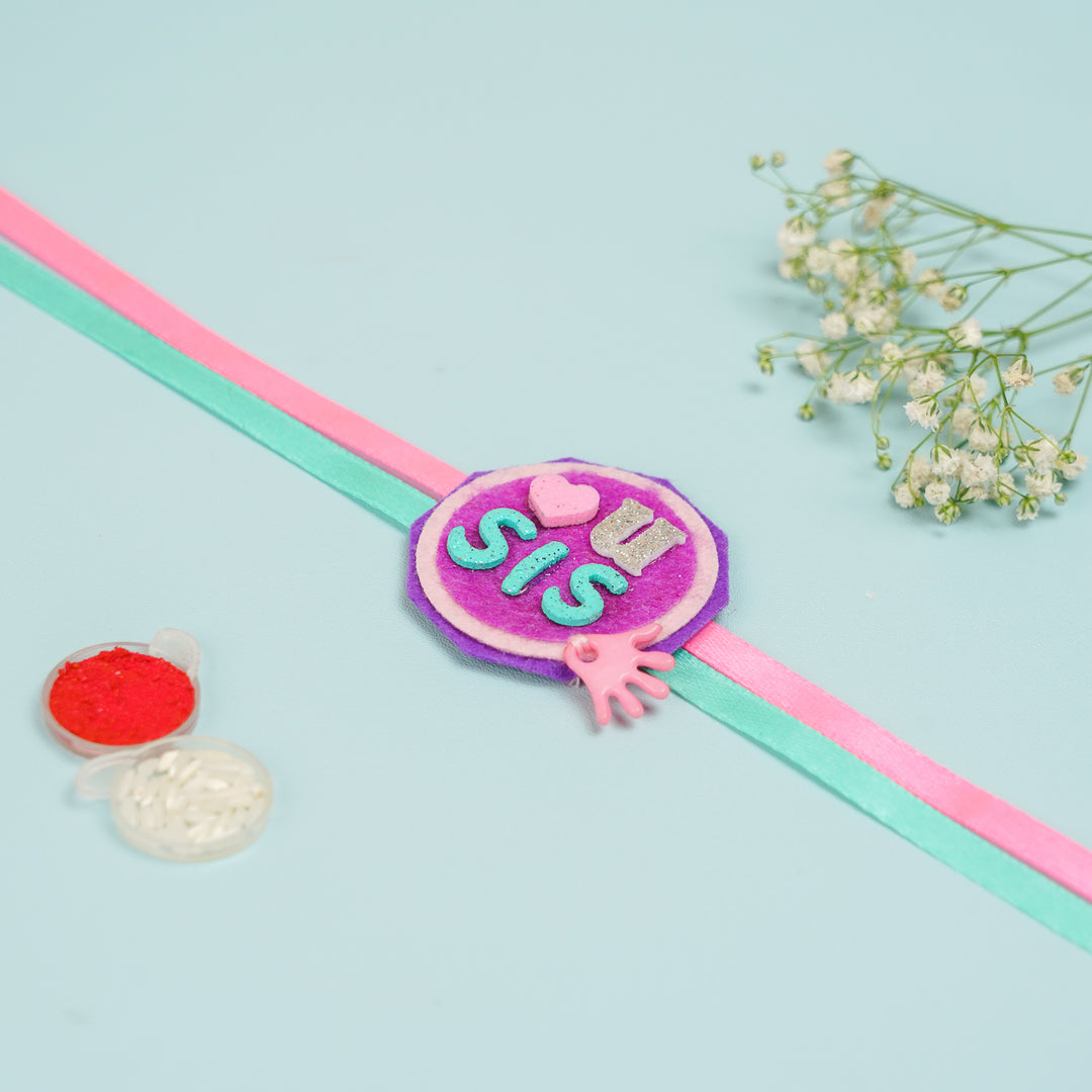 Handmade Sister Felt Rakhi Hamper With Roli Chawal Includes 1 Decorative Plaque 1 Rakhi - Wristband Laid Flat with Decorations