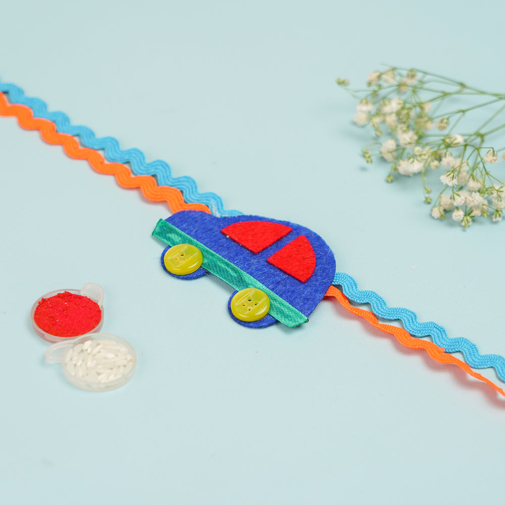 Handmade Car Theme Felt Kids Rakhi With Roli Chawal 2 - Flat Lay Showing Full Band