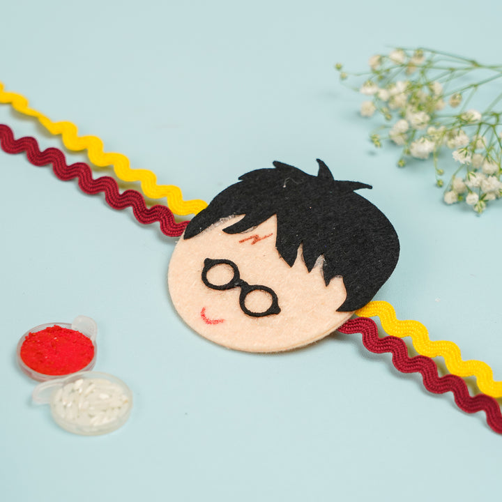 Handmade Harry Potter Theme Felt Rakhi Hamper With Roli Chawal Includes 1 Pouch 1 Rakhi - Wristband Placed with Accessories