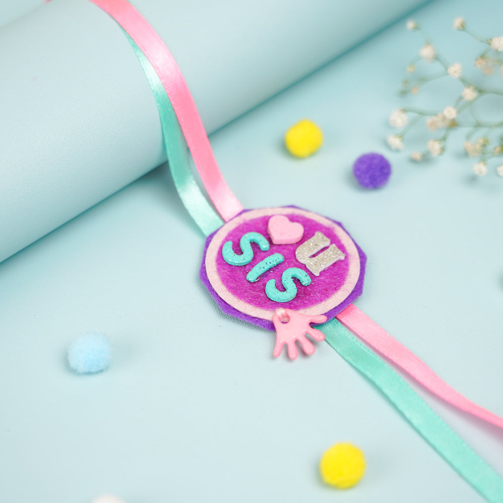 Handmade Love You Sis Felt Kids Rakhi With Roli Chawal - Close-up View