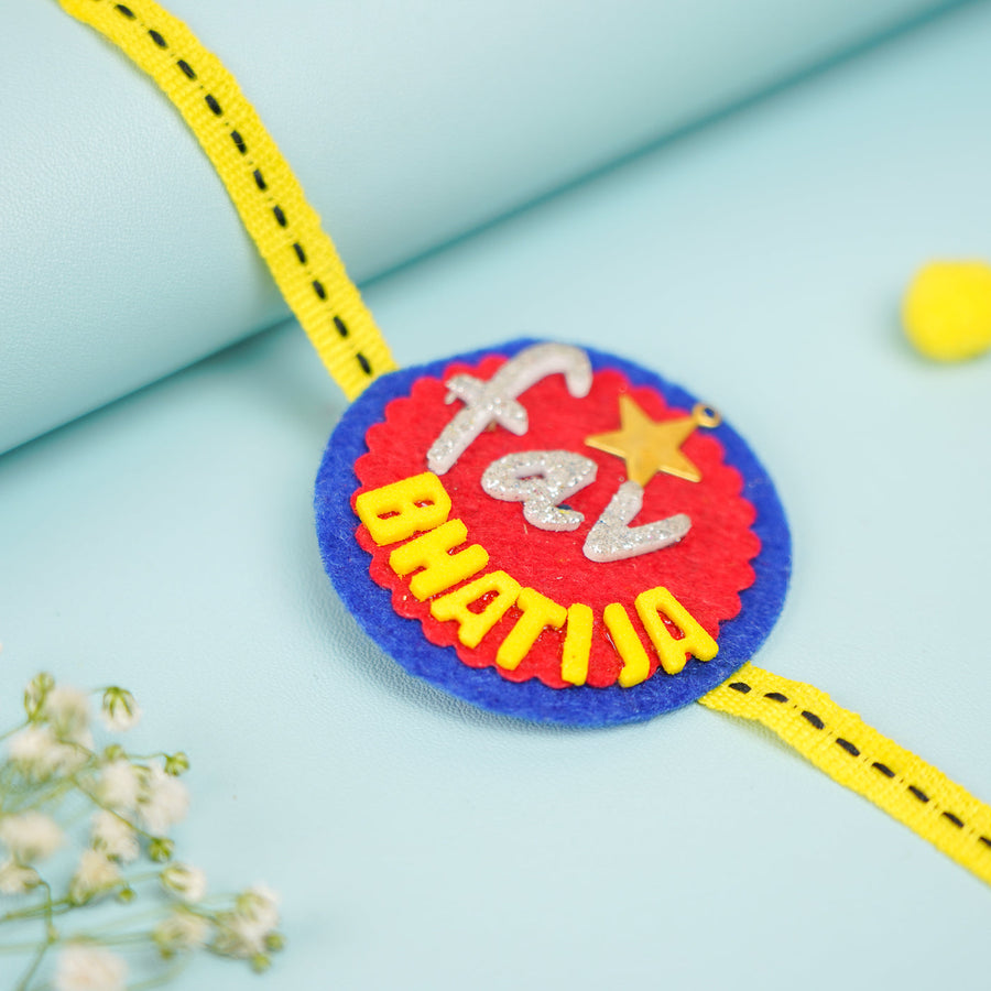 Handmade Fav Bhatija Felt Kids Rakhi With Roli Chawal - Close-up of Rakhi Design