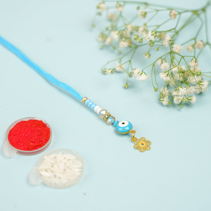 Handmade Beaded Blue Evil Eye Bhaiya Bhabhi Rakhi With Roli Chawal Set Of 2 - Bracelet Charm with Accessories Close-up