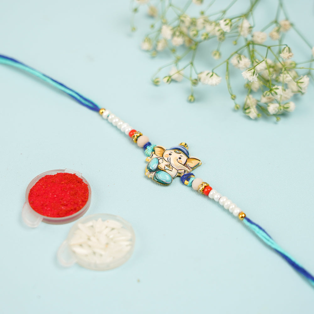 Handmade Baal Ganesha Rakhi With Roli Chawal - Rakhi with Tikka and Rice Set
