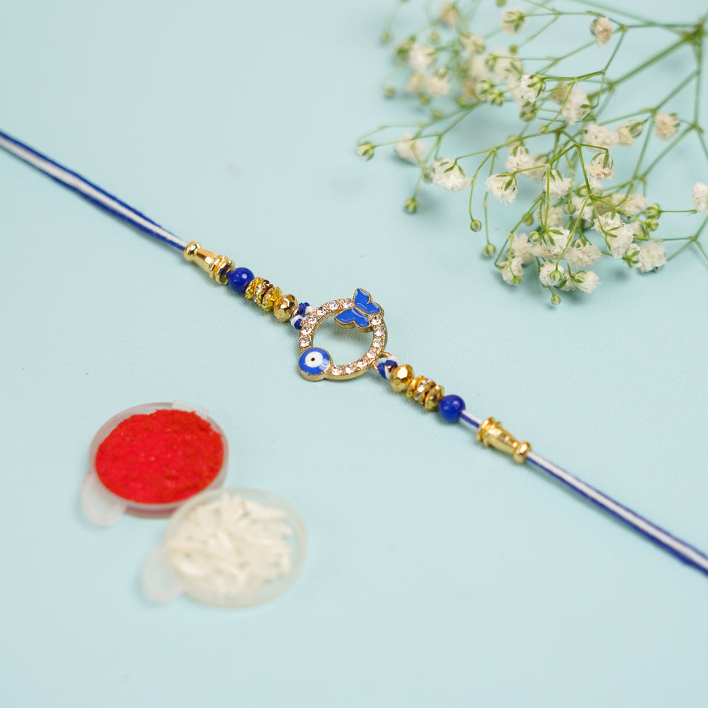 Handmade Beaded Buttefly And Evil Eye Rakhi With Roli Chawal - Full View with Decorative Items