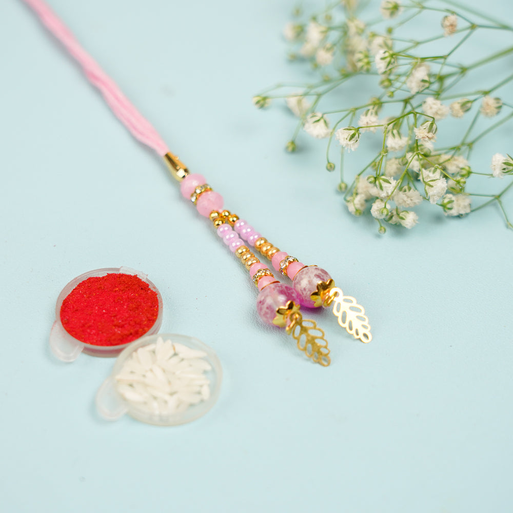 Handmade Pink Beads And Leaf Lumba Rakhi For Bhabhi With Roli Chawal - Pendant with Accessories and Flowers