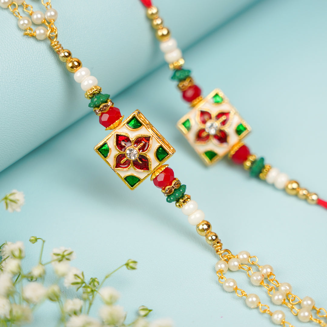 Handmade Square Jadtar And Pearl Bhaiya Bhabhi Rakhi With Roli Chawal Set Of 2 - Close-up of central embellishment