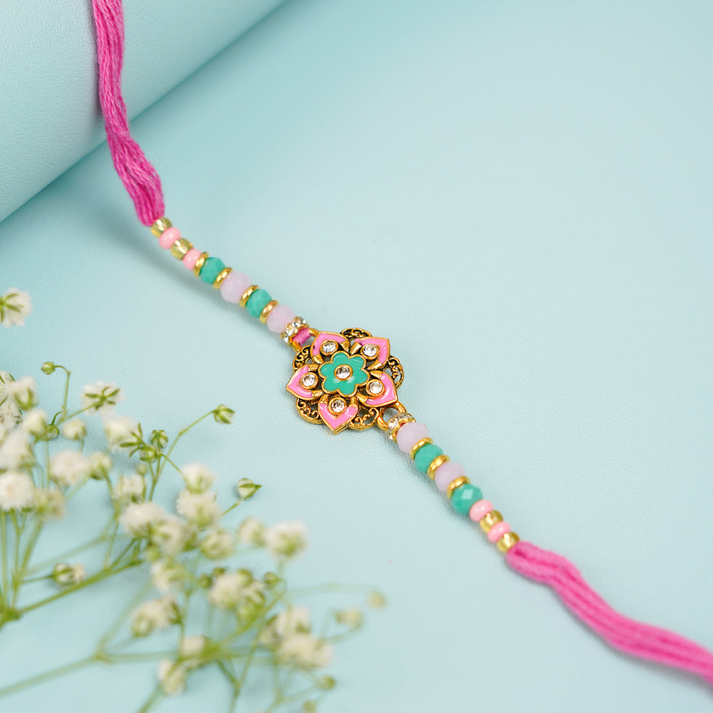 Handmade Beaded Pink And Green Bhaiya Bhabhi Rakhi With Roli Chawal Set Of 2 - Single Bracelet Front View