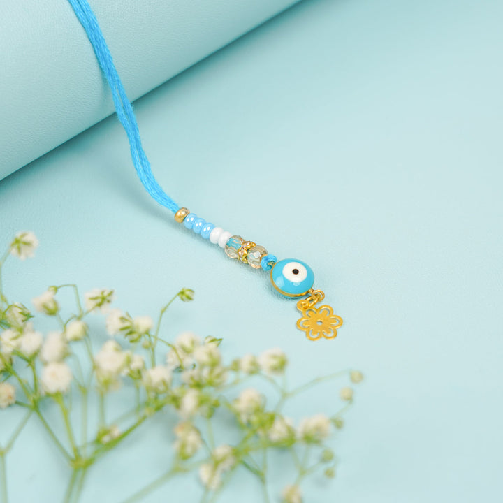 Handmade Beaded Blue Evil Eye Bhaiya Bhabhi Rakhi With Roli Chawal Set Of 2 - Single Bracelet Charm Detail
