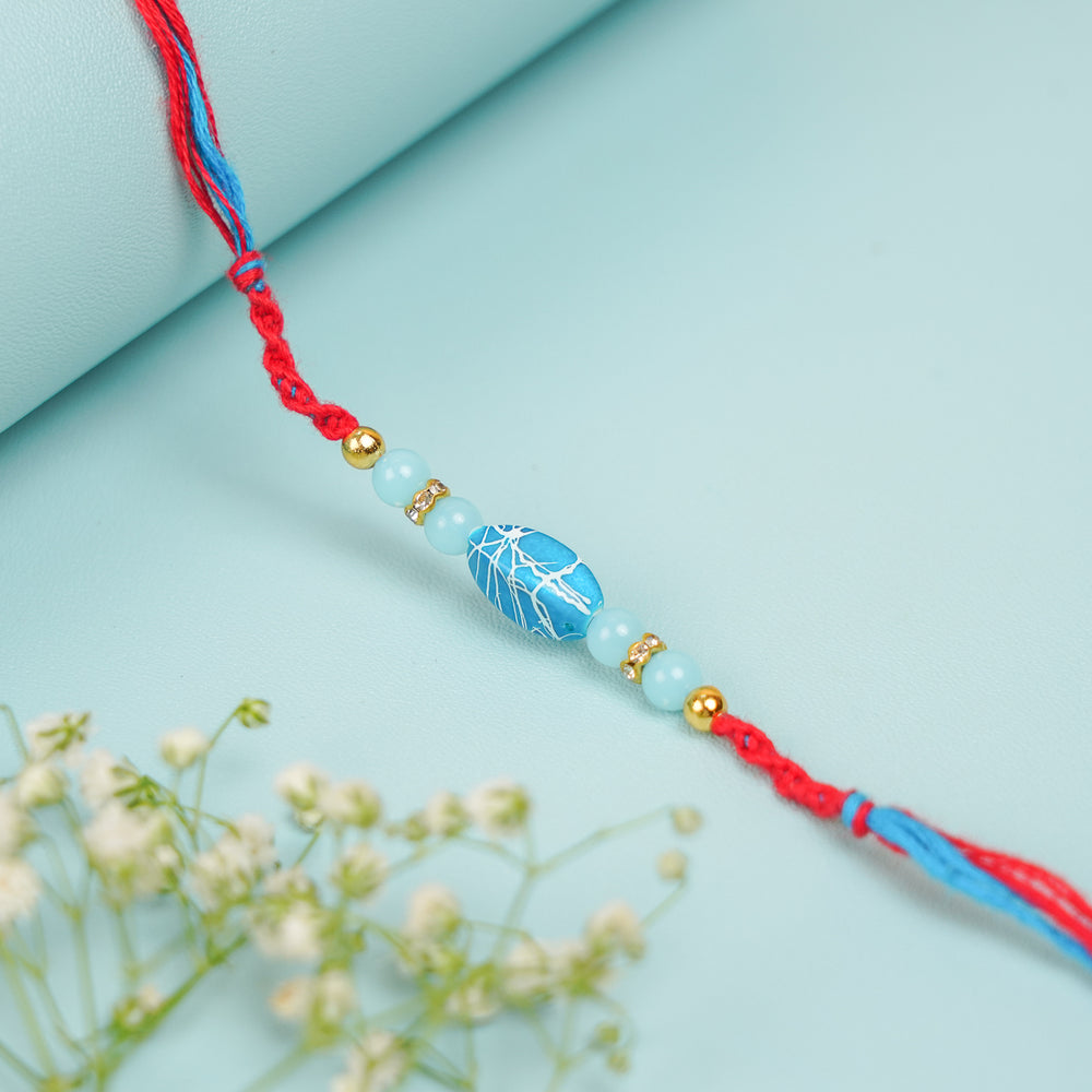 Handmade Beaded Blue And Green Stone Rakhi With Roli Chawal Set Of 2 - Single Bracelet Front View