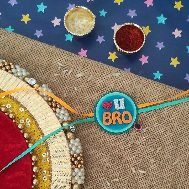Personalized Handmade Girraffe Theme Felt Kids Rakhi And Photo Frame Combo For Kids Set Of 2 - "Love U Bro" Rakhi on Decorative Setup