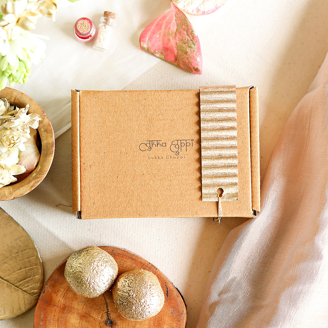Handmade Reusable Dual Layer Upcycled Fabric Rakhi With Roli Chawal For Brother - Packaging box with branding
