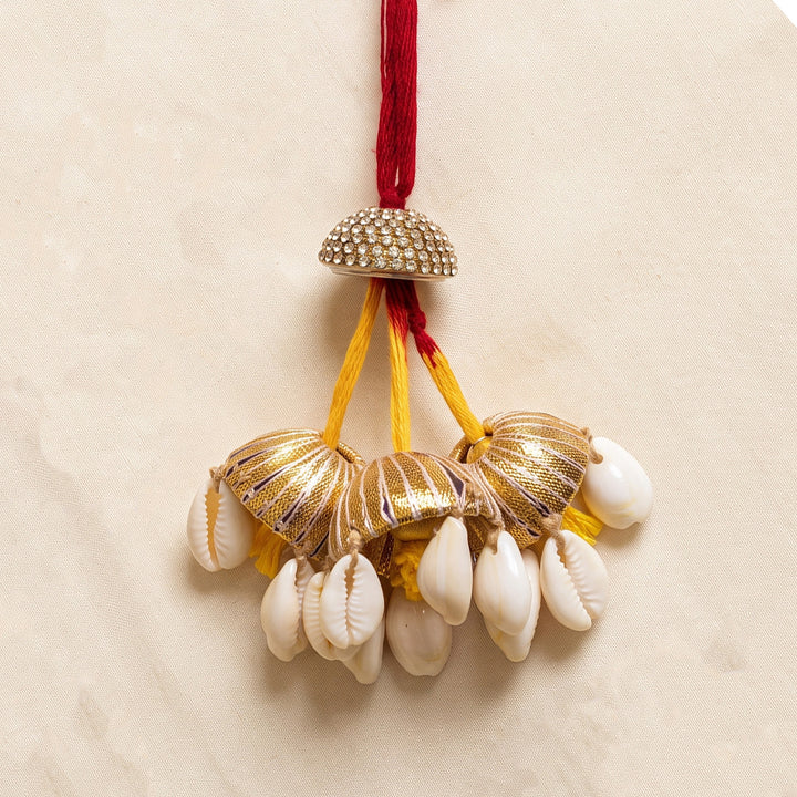 Gold Shell Hanging Lumba Rakhi With Roli Chawal For Sister/Bhabhi