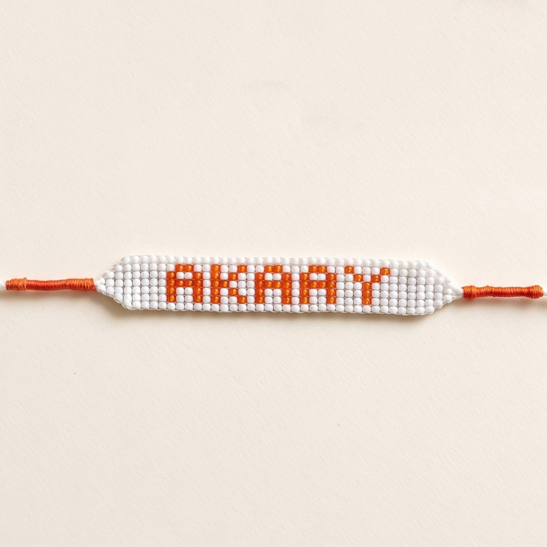 Personalized Hand Beaded White Base Bracelet Rakhi With Roli Chawal For Brother