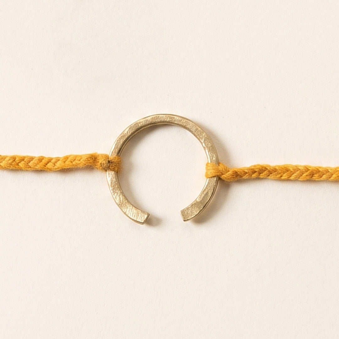 Handcrafted "Horse Shoe" Yellow Brass Rakhi With Roli Chawal For Brother