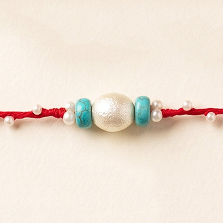 Handcrafted Pearls & Stones Rakhi With Roli Chawal For Brother