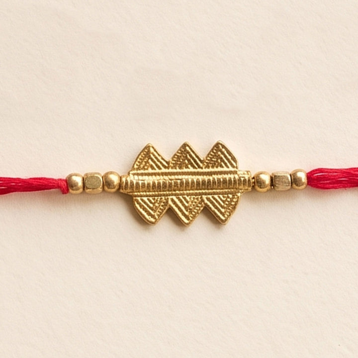 Beaded Keepsake Brass Rakhi With Roli Chawal For Brother