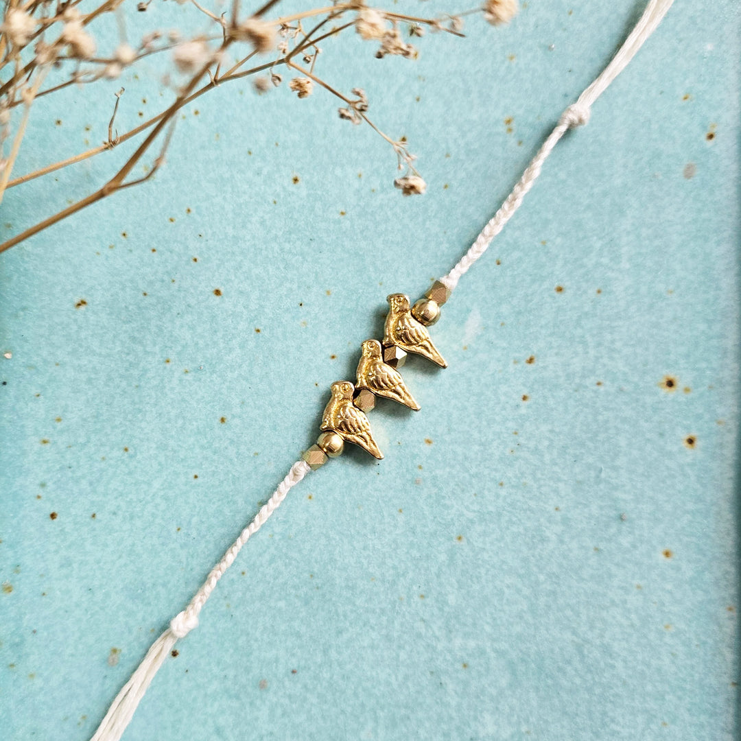 Handcrafted Brass Bird Rakhi With Roli Chawal For Sister