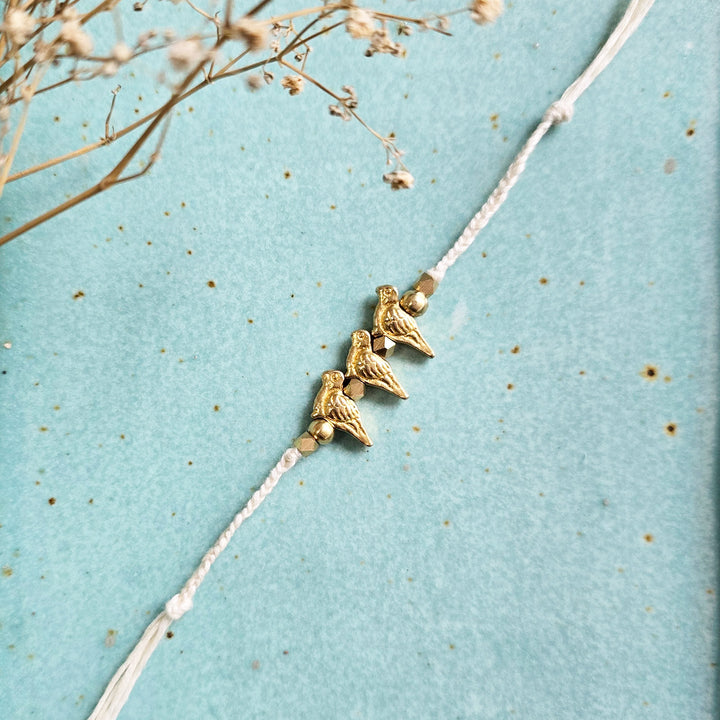 Handcrafted Brass Bird Rakhi With Roli Chawal For Sister