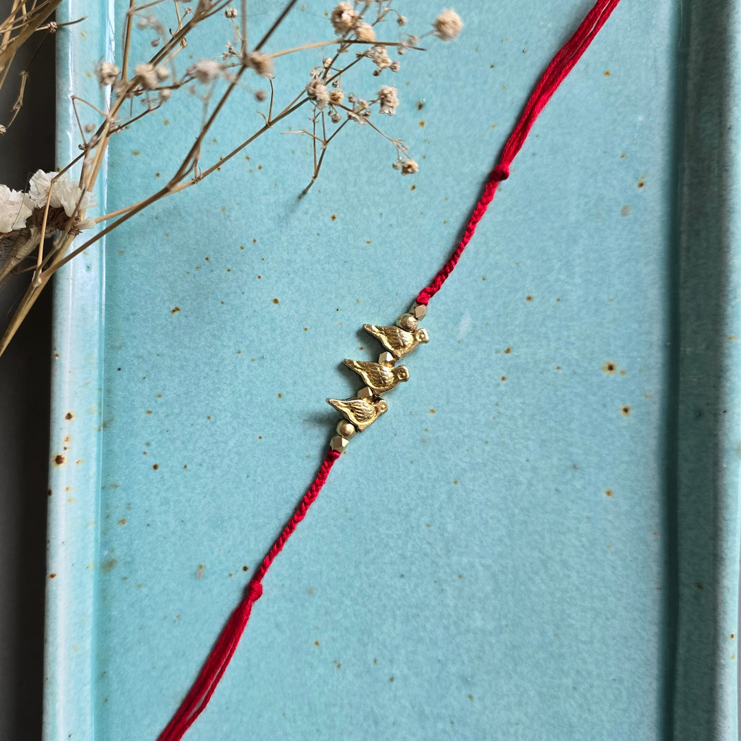 Handcrafted Brass Bird Rakhi With Roli Chawal For Sister