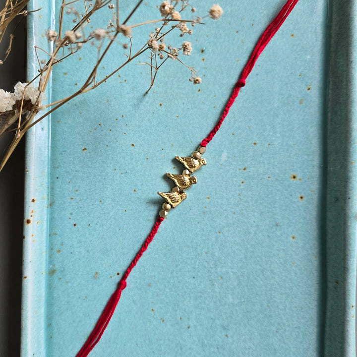 Handcrafted Brass Bird Rakhi With Roli Chawal For Sister