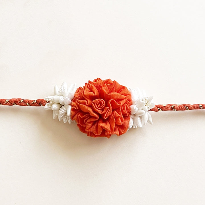Handcrafted Rose & Mogra Bud Silk Fabric Floral Rakhi For Brother With Roli Chawal