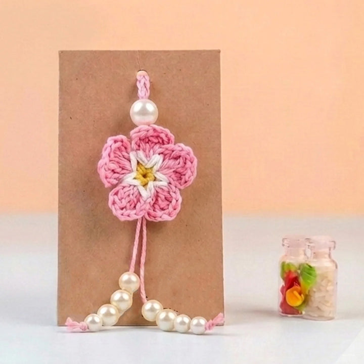 Handmade Crochet Cherry Blossom Lumba Rakhi For Bhabhi With Roli Chawal