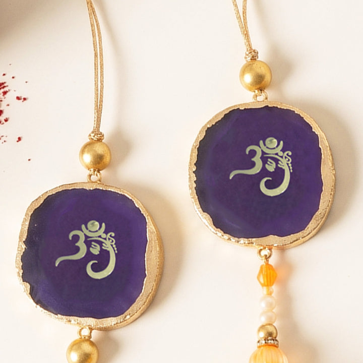 Handmade "Om" Purple Premium Agate Bhaiya Bhabhi Couple Rakhi And Lumba Set With Roli Chawal, Nariyal And Gift Box | Set of 2